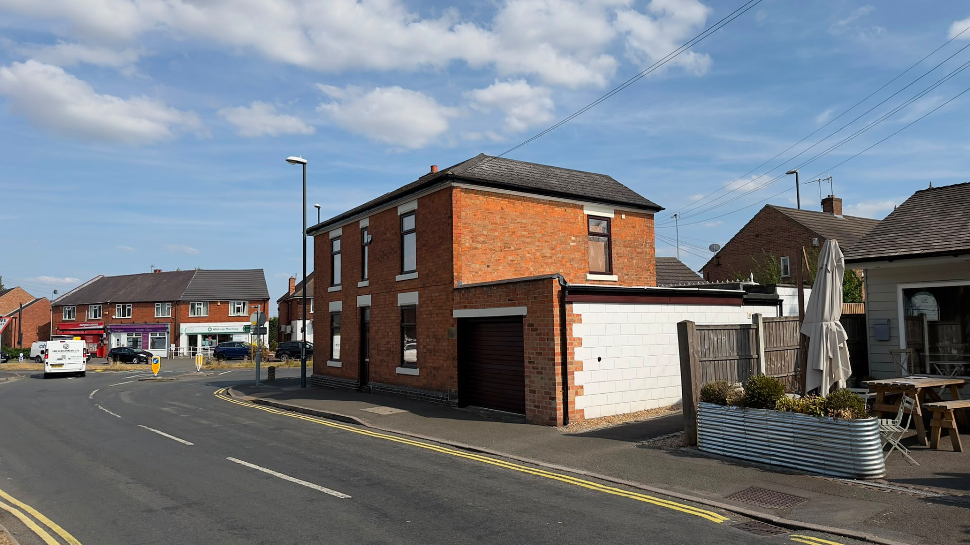 1 Park Lane, Allestree — the new offices seen from the street, next to Allestree shops and pharmacy
