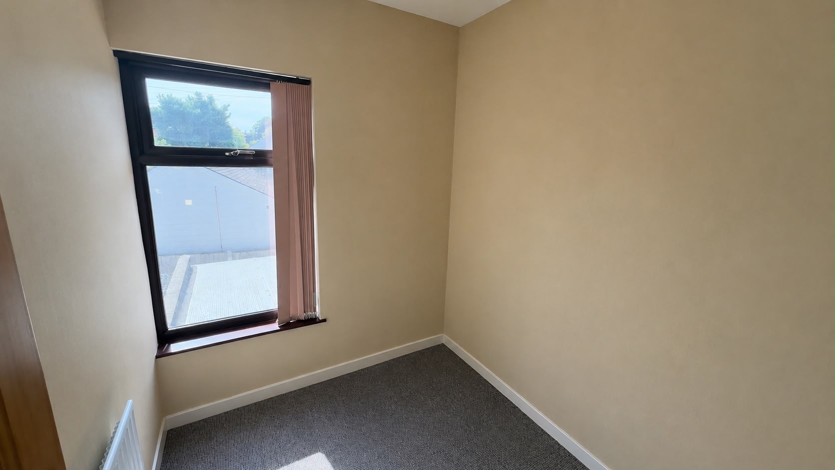 Smaller quiet office room overlooking the courtyard